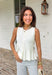 This cream button down sweater tank is the effortless summer staple your closet will thank you for! Lightweight with a soft knit feel, it’s perfect for staying cool while still looking put together. The neutral buttons add a classic touch, making it easy to dress up or keep casual. Wear it on its own with denim shorts or wide leg pants, or layer it under a lightweight top for those breezy evenings. It’s one of those versatile pieces that works for everything from coffee runs to casual dinners.