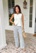 This cream button down sweater tank is the effortless summer staple your closet will thank you for! Lightweight with a soft knit feel, it’s perfect for staying cool while still looking put together. The neutral buttons add a classic touch, making it easy to dress up or keep casual. Wear it on its own with denim shorts or wide leg pants, or layer it under a lightweight top for those breezy evenings. It’s one of those versatile pieces that works for everything from coffee runs to casual dinners.