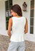 This cream button down sweater tank is the effortless summer staple your closet will thank you for! Lightweight with a soft knit feel, it’s perfect for staying cool while still looking put together. The neutral buttons add a classic touch, making it easy to dress up or keep casual. Wear it on its own with denim shorts or wide leg pants, or layer it under a lightweight top for those breezy evenings. It’s one of those versatile pieces that works for everything from coffee runs to casual dinners.