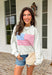 This heather grey pullover is the perfect cozy-meets-festive piece for your summer celebrations! Featuring red and white stripes with a blue and white gingham flag, it brings a fun, playful take on classic patriotic style. The mock neck adds a slightly elevated feel, while the soft cotton fabric keeps it comfortable for those breezy summer nights—think fireworks, lake evenings, or early morning coffee runs. It’s an easy throw-on piece that still feels festive and put together. 