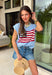 This light blue sweater top is the perfect way to celebrate summer in style! Featuring an American flag design on the front, it brings all the patriotic charm while still feeling classic and easy to wear. The lightweight knit construction makes it ideal for warm-weather celebrations, and the cap sleeves add a flattering, feminine touch. Whether you're heading to a backyard BBQ, a parade, a lake weekend, or fireworks with friends, this top is ready for all your 4th of July festivities. 