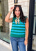 Classic stripes get a bold fall refresh with this cozy sleeveless sweater! Featuring a rich pine green knit with vibrant blue stripes, this sleeveless top is an easy way to add color to your seasonal wardrobe. Functional gold button closures along the sides add a unique, elevated touch, while the ribbed crew neckline and hem give it a timeless finish.