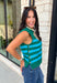Classic stripes get a bold fall refresh with this cozy sleeveless sweater! Featuring a rich pine green knit with vibrant blue stripes, this sleeveless top is an easy way to add color to your seasonal wardrobe. Functional gold button closures along the sides add a unique, elevated touch, while the ribbed crew neckline and hem give it a timeless finish.