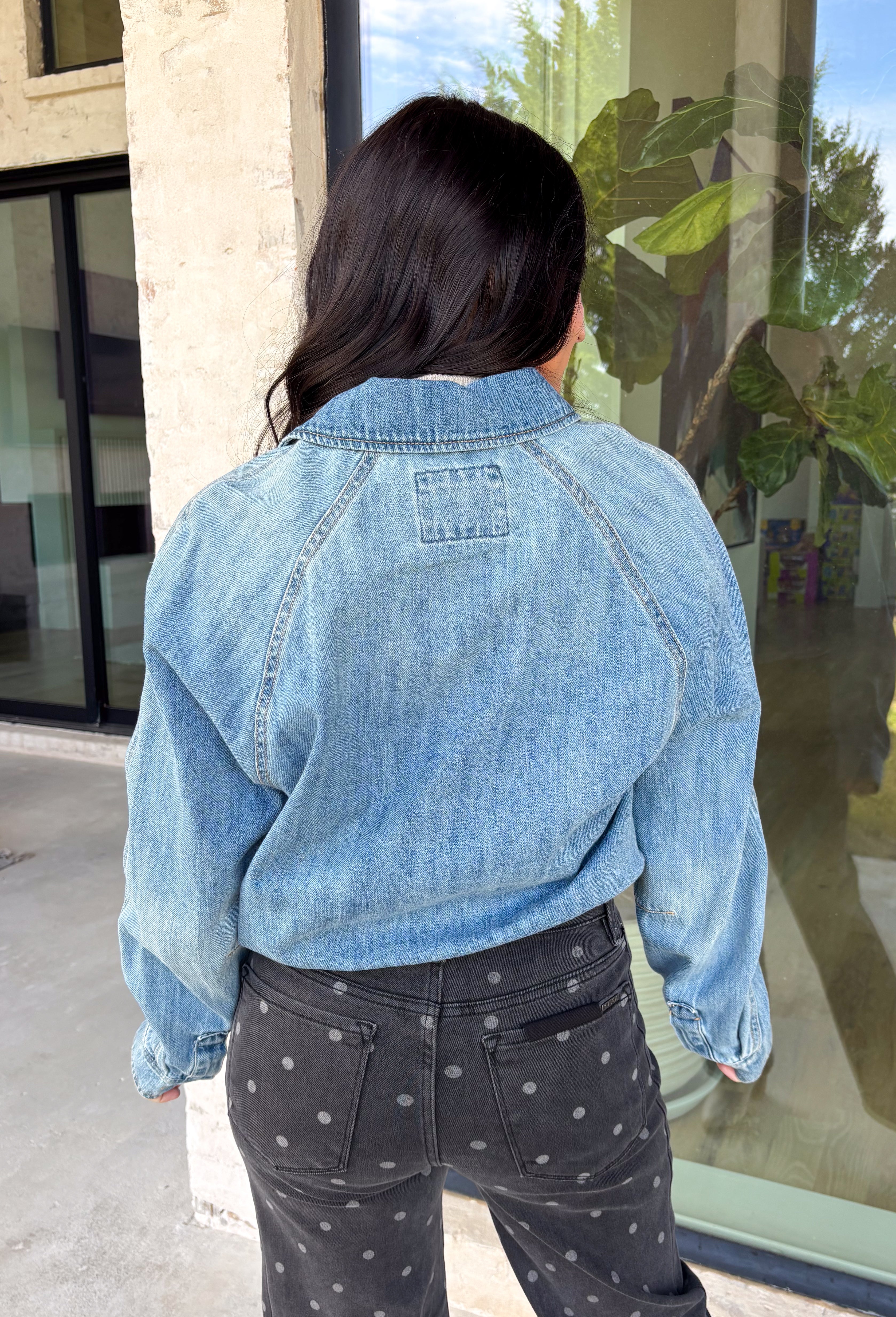 A classic denim layer gets a fresh update with this medium wash jacket from Risen. The timeless wash makes it easy to throw on with everything from fall dresses to cozy knits, while the front zipper closure gives it a more modern feel than your traditional button-front denim jacket. A collared neckline keeps the look classic, and button cuffs add a familiar denim detail at the sleeves. The adjustable toggle drawstring hem lets you customize the shape, while side pockets add everyday function.