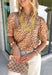 A timeless leopard print gets a fresh fall update in this effortlessly chic top! Featuring a classic leopard print with beautiful yellow embroidered detailing along the ruffle neckline, this top adds the perfect pop of color to your autumn wardrobe. The short puff sleeves create a feminine silhouette, while the breathable cotton fabric keeps it comfortable enough for all-day wear. 