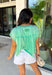 This green short sleeve top is the kind of easy, go-to piece you’ll reach for all summer long! The smocking detail across the front adds just the right amount of texture while creating a flattering, comfortable fit. Made from breathable 100% cotton, it’s lightweight and perfect for staying cool on warm days. It’s simple, versatile, and effortlessly put together—exactly what you want for busy days on the go. Pair it with denim shorts, white jeans, or a skirt for an easy everyday look. 