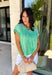This green short sleeve top is the kind of easy, go-to piece you’ll reach for all summer long! The smocking detail across the front adds just the right amount of texture while creating a flattering, comfortable fit. Made from breathable 100% cotton, it’s lightweight and perfect for staying cool on warm days. It’s simple, versatile, and effortlessly put together—exactly what you want for busy days on the go. Pair it with denim shorts, white jeans, or a skirt for an easy everyday look. 