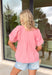 Soft, feminine, and perfectly polished for spring days, this light pink top is all about the little details. The tonal darker pink threading along the neckline, sleeves, and hem adds subtle texture and dimension, giving this classic silhouette a sweet elevated touch. Puff sleeves bring a playful, romantic feel, while the lightweight 100% cotton fabric keeps it breathable and easy to wear all season long. A delicate keyhole closure in the back finishes the look with just the right hint of charm. 
