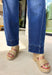 Relaxed, cool, and effortlessly on-trend! These dark wash slouchy crop barrel jeans by Risen bring the perfect mix of comfort and style. The slouchy fit and cropped length give them that laid-back, modern feel, while the rich dark wash keeps them easy to dress up or down. Designed with added stretch for all-day comfort, these jeans move with you while maintaining their shape. The barrel silhouette adds a fun, fashion-forward touch that makes them a standout piece in your everyday rotation.