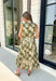 Classic plaid meets soft florals in this charming midi dress that's made for all your favorite fall occasions! Featuring an olive plaid backdrop with a neutral floral print, this cotton dress offers a unique blend of timeless patterns that feels effortlessly seasonal. The flattering v-neckline and sleeveless silhouette make it easy to wear on its own during warmer days or layered under a cardigan or denim jacket as the temperatures cool. 