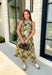 Classic plaid meets soft florals in this charming midi dress that's made for all your favorite fall occasions! Featuring an olive plaid backdrop with a neutral floral print, this cotton dress offers a unique blend of timeless patterns that feels effortlessly seasonal. The flattering v-neckline and sleeveless silhouette make it easy to wear on its own during warmer days or layered under a cardigan or denim jacket as the temperatures cool. 