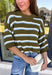 Fresh stripes and easy fall colors come together in this short sleeve sweater from Entro. The olive base is accented with off white and light blue stripes for a color combination that feels a little unexpected while still being easy to style. Made from 100% cotton, the knit has a comfortable feel that works especially well during those in-between fall days when it’s not quite cool enough for heavy layers. 