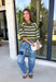 Fresh stripes and easy fall colors come together in this short sleeve sweater from Entro. The olive base is accented with off white and light blue stripes for a color combination that feels a little unexpected while still being easy to style. Made from 100% cotton, the knit has a comfortable feel that works especially well during those in-between fall days when it’s not quite cool enough for heavy layers. 