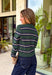 Nothing says cozy season quite like a classic striped cardigan! This hunter green knit features timeless navy blue and off white stripes, making it the perfect layering piece for all your fall adventures. Designed with a button-down front and an irresistibly soft feel, it's easy to wear open over your favorite basics or buttoned as a sweater for a polished look. 