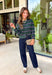 Nothing says cozy season quite like a classic striped cardigan! This hunter green knit features timeless navy blue and off white stripes, making it the perfect layering piece for all your fall adventures. Designed with a button-down front and an irresistibly soft feel, it's easy to wear open over your favorite basics or buttoned as a sweater for a polished look. 
