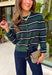 Nothing says cozy season quite like a classic striped cardigan! This hunter green knit features timeless navy blue and off white stripes, making it the perfect layering piece for all your fall adventures. Designed with a button-down front and an irresistibly soft feel, it's easy to wear open over your favorite basics or buttoned as a sweater for a polished look. 