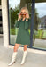 Simple, chic, and oh-so-flattering — this hunter green dress by Entro is a must-have for the season. Designed with a split v-neck and stand collar, it gives off an effortlessly polished vibe that can go from workday to weekend with ease. The soft stretch blend keeps it comfy, while the side pockets add a practical touch. Perfect on its own or layered with a jacket for those crisp fall days.