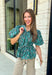 Add a little charm to your everyday wardrobe with this beautifully detailed blouse that's full of fall-inspired style. Featuring hunter green and light blue stripes layered with a neutral floral print, this top offers a fresh take on two timeless patterns. The puff sleeves, button-front design, and elastic drawstring waist create a flattering silhouette that's both comfortable and polished. 