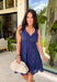 Classic, feminine, and effortlessly flattering! This sleeveless navy eyelet lace dress is the kind of piece you’ll reach for again and again. The intricate eyelet detailing adds texture and charm, while the rich navy color keeps it timeless and easy to style. Designed with smocking along the back for a comfortable, flexible fit and an elastic waist that gently defines your shape, this dress blends beauty with everyday ease. 