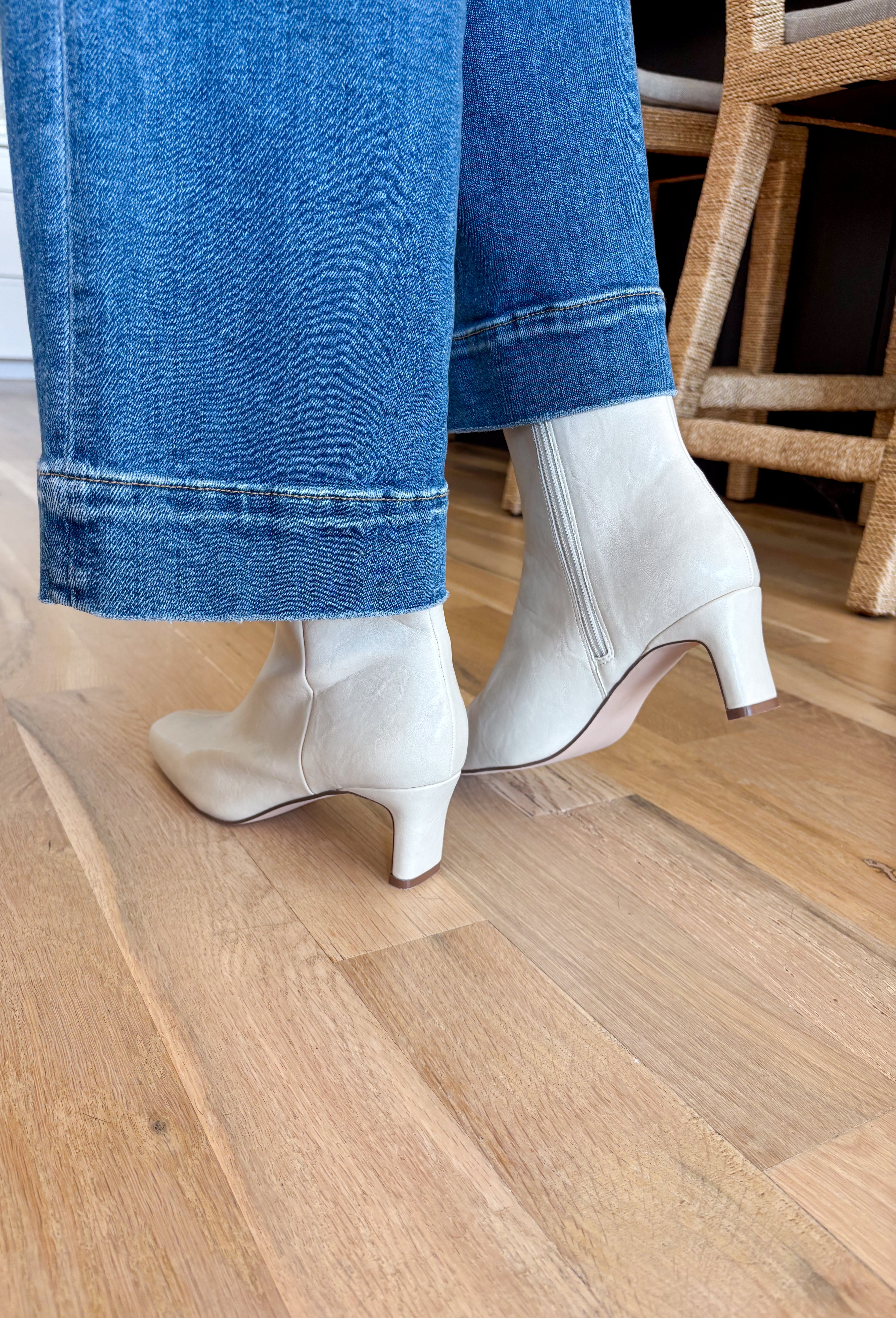 Minimalist design meets modern edge in this bone vegan faux leather ankle boot by Beach By Matisse. With its sleek pointed toe, slim mid-heel, and clean silhouette, it’s a versatile style that dresses up or down with ease. Comfortable and chic, this boot is the perfect finishing touch for both casual everyday outfits and elevated looks.