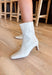 Minimalist design meets modern edge in this bone vegan faux leather ankle boot by Beach By Matisse. With its sleek pointed toe, slim mid-heel, and clean silhouette, it’s a versatile style that dresses up or down with ease. Comfortable and chic, this boot is the perfect finishing touch for both casual everyday outfits and elevated looks.
