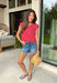 This red stripe tank is the ultimate classic for summer—especially for all your 4th of July plans! The white stripe print keeps it timeless, while the muscle tank style with soft shoulder pads adds that structured, on-trend touch. The elastic hem creates a flattering, easy shape that pairs perfectly with denim or shorts. Made from a lightweight, breathable blend, it’s comfortable enough for all-day wear—from backyard BBQs to fireworks. This is one of those effortless pieces that always looks put together.