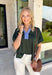 Bring a fresh pop of color to your fall wardrobe with this effortlessly polished forest green top! The rich seasonal hue is beautifully accented by light blue trim along the front, creating a timeless look with just the right amount of contrast. Soft elastic sleeves add a feminine touch while offering all-day comfort, and the stretchy knit fabric makes this an easy piece to wear from morning meetings to weekend outings. It's a versatile staple you'll reach for again and again throughout the season.