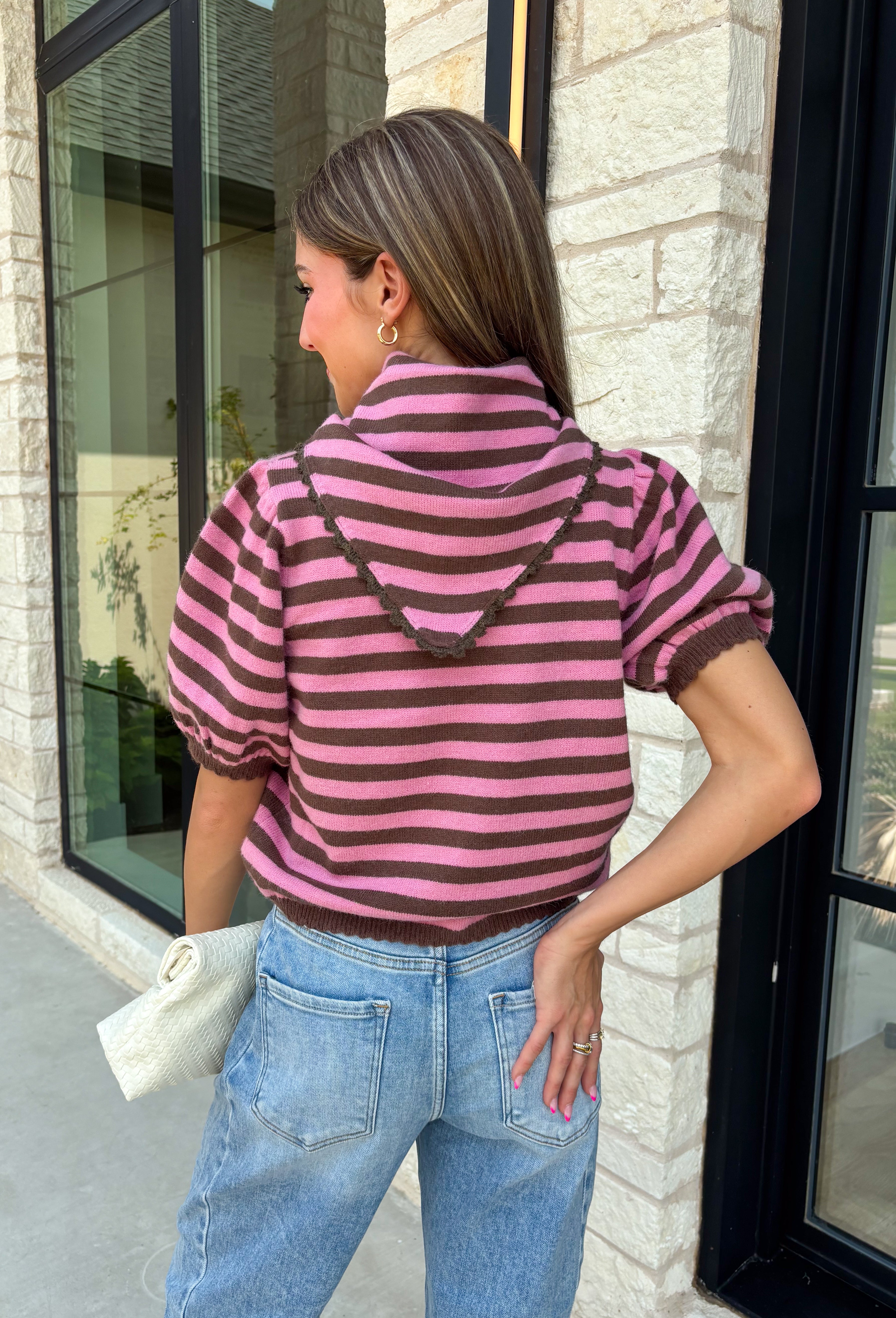 Sweet, polished, and full of charming details, this short sleeve sweater is the perfect way to elevate your fall wardrobe. Featuring pink and brown stripes, this cozy knit combines timeless color with feminine touches you'll love. The self-tie collar adds a playful finish, while the delicate scallop trim and puff sleeves create an effortlessly polished look. Whether you're headed to the office, brunch with friends, or a weekend coffee date, this sweater is an easy favorite you'll reach for all season long.