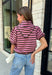 Sweet, polished, and full of charming details, this short sleeve sweater is the perfect way to elevate your fall wardrobe. Featuring pink and brown stripes, this cozy knit combines timeless color with feminine touches you'll love. The self-tie collar adds a playful finish, while the delicate scallop trim and puff sleeves create an effortlessly polished look. Whether you're headed to the office, brunch with friends, or a weekend coffee date, this sweater is an easy favorite you'll reach for all season long.