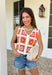 This sleeveless crochet lace embroidered top is bringing all the vibrant, sunshine-ready energy. Designed with a colorful mix of off white, orange, pink, blue, and mustard, it’s the kind of piece that instantly makes an outfit feel fun and fresh. The intricate crochet lace and embroidered details give it that handcrafted look we love, while the button-down front keeps it classic and easy to style. With its cropped length, it pairs perfectly with high-rise denim, skirts, or shorts.