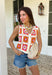 This sleeveless crochet lace embroidered top is bringing all the vibrant, sunshine-ready energy. Designed with a colorful mix of off white, orange, pink, blue, and mustard, it’s the kind of piece that instantly makes an outfit feel fun and fresh. The intricate crochet lace and embroidered details give it that handcrafted look we love, while the button-down front keeps it classic and easy to style. With its cropped length, it pairs perfectly with high-rise denim, skirts, or shorts.