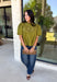 Pretty details make this olive top from Entro one you'll want to work into your fall rotation. The rich olive shade feels perfect for the season, while eyelet detailing and crochet trim add texture and interest to the solid design. A ruffled neckline brings a sweet finishing touch, and short puff sleeves give the silhouette just the right amount of shape. 