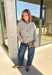 Wrap yourself in all the cozy fall vibes with this chunky knit cardigan! The neutral knit is beautifully accented with subtle orange and black speckles, giving it the perfect autumn-inspired look that's easy to style with everything in your closet. Finished with charming wooden buttons and functional front pockets, this cardigan is made for crisp mornings, pumpkin patch outings, coffee runs, and relaxing weekends. 