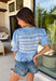 This blue lace ruffle top is such a dreamy piece for summer! With its delicate lace, layered ruffle details, and soft textured fabric, it brings the perfect mix of feminine and effortless style. The smocking throughout creates a flattering, comfortable fit while adding beautiful dimension. Lightweight and breathable in 100% cotton, it’s ideal for warm days when you still want something a little elevated. 