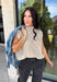 Easy to layer and perfect for those in-between weather days, this oatmeal sleeveless sweater from Day + Moon brings a cozy feel without the extra weight. The soft neutral shade makes it endlessly versatile, while open knit detailing along the front adds texture and gives the simple silhouette a little something extra. A mock neckline adds a classic cold-weather touch, making it especially cute layered under a jacket or cardigan as temperatures start to drop. 