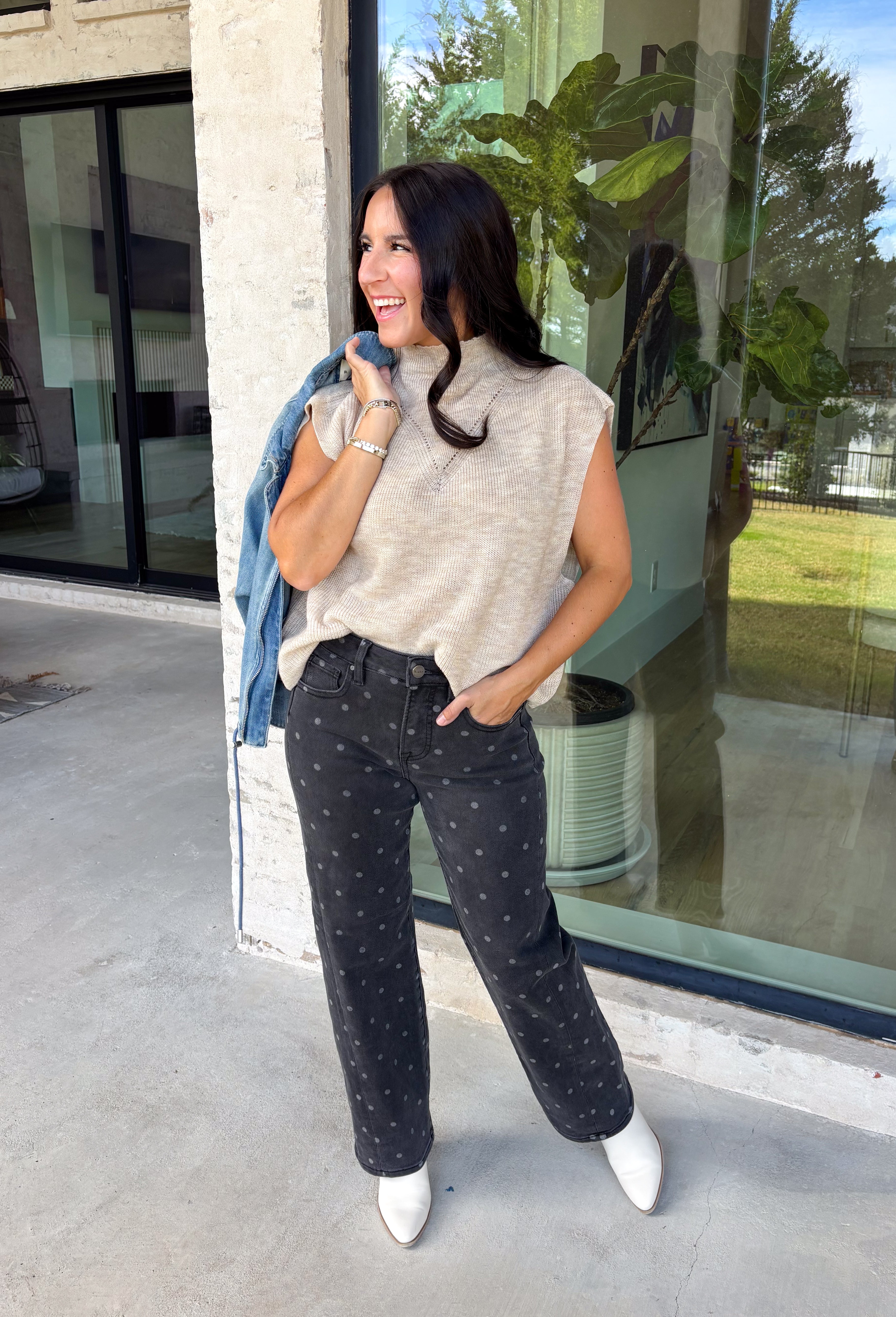 Easy to layer and perfect for those in-between weather days, this oatmeal sleeveless sweater from Day + Moon brings a cozy feel without the extra weight. The soft neutral shade makes it endlessly versatile, while open knit detailing along the front adds texture and gives the simple silhouette a little something extra. A mock neckline adds a classic cold-weather touch, making it especially cute layered under a jacket or cardigan as temperatures start to drop. 