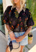 This black floral top is such a fun, vibrant pick for summer! The colorful mix of yellow, orange, purple, and green pops beautifully against the black base, making it an easy statement piece. The scalloped neckline and hem add the sweetest feminine detail, while the puff sleeves with elastic give it that flattering, easy shape. Lightweight and breathable in 100% cotton, it’s perfect for warm days when you still want to feel put together. 