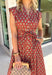 Capture the beauty of the season in this effortlessly charming rust midi dress. Featuring an abstract dainty floral and geo-inspired print with subtle pops of green, blue, and tan, this dress brings the perfect touch of autumn color to your wardrobe. The elastic waist with a self-tie detail creates a flattering, comfortable fit, while the button front and flowing midi silhouette give it timeless appeal. 
