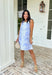 Fresh, sweet, and made for sunny spring days, this light blue sleeveless mini dress by Entro is an easy favorite. Featuring an off-white botanical print throughout, it gives that clean, airy look that feels perfect for the season. The straight neckline keeps it simple and flattering, while the back zipper closure makes it easy to slip on and go. Fully lined and finished with side pockets (because we love a practical moment), this dress is perfect for brunch, showers, and weekend plans.