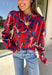 Make a statement this season in this red cropped sweater featuring an eye-catching abstract blue floral print. The cozy knit keeps you warm while the mock neck adds a touch of chic structure. With its cropped length, this sweater pairs effortlessly with high-rise jeans, skirts, or trousers—perfect for when you want comfort without sacrificing style.