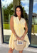 This sleeveless yellow and white striped dress by Entro is the definition of easy spring style! It’s bright, classic, and so effortless—aka the kind of piece you can throw on and instantly feel put-together. The button-down front gives it that timeless shirt dress vibe, while the tiered skirt adds a soft, flowy shape that feels fun and feminine without being fussy. The elastic waist helps create a flattering fit.