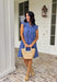 Easy, breezy, and full of tropical charm! This blue short sleeve tiered dress features a beautiful white embroidered leaf print that gives it that fresh, getaway-ready feel. The flowy tiered silhouette adds movement and comfort, making it perfect for warm spring days. Finished with embroidered trim on the sleeves for an extra touch of detail, this dress blends relaxed style with a polished look. 