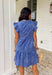 Easy, breezy, and full of tropical charm! This blue short sleeve tiered dress features a beautiful white embroidered leaf print that gives it that fresh, getaway-ready feel. The flowy tiered silhouette adds movement and comfort, making it perfect for warm spring days. Finished with embroidered trim on the sleeves for an extra touch of detail, this dress blends relaxed style with a polished look. 