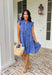 Easy, breezy, and full of tropical charm! This blue short sleeve tiered dress features a beautiful white embroidered leaf print that gives it that fresh, getaway-ready feel. The flowy tiered silhouette adds movement and comfort, making it perfect for warm spring days. Finished with embroidered trim on the sleeves for an extra touch of detail, this dress blends relaxed style with a polished look. 