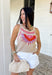 Meet your new golden hour favorite! This neutral sweater tank features a dreamy abstract sun print in shades of pink, orange, and purple — the prettiest pop of color against a soft, wearable base. It’s bold enough to stand out, yet neutral enough to pair with just about anything. Cable knit texture throughout adds cozy dimension, while the open knit detailing along the hem and top keeps it lightweight and breathable. Finished with scalloped edges along the sleeves and neckline.
