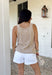 Meet your new golden hour favorite! This neutral sweater tank features a dreamy abstract sun print in shades of pink, orange, and purple — the prettiest pop of color against a soft, wearable base. It’s bold enough to stand out, yet neutral enough to pair with just about anything. Cable knit texture throughout adds cozy dimension, while the open knit detailing along the hem and top keeps it lightweight and breathable. Finished with scalloped edges along the sleeves and neckline.