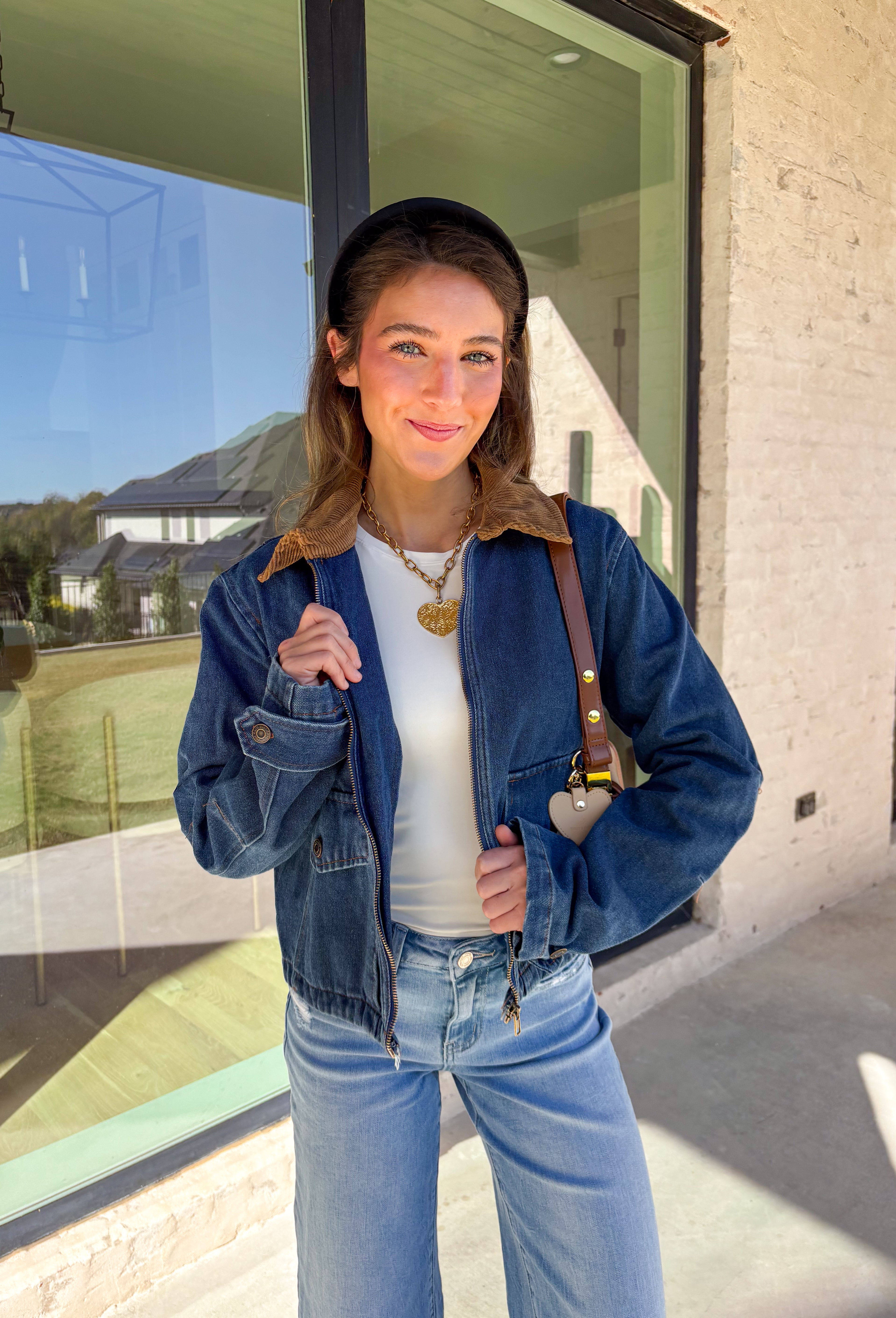 Classic and effortlessly cool, this denim barn jacket by Haute Monde is the perfect layer for the winter season. Featuring a soft brown corduroy collar and zip-front closure, it blends timeless design with everyday comfort. Functional front pockets and structured denim give it that lived-in look you’ll love for layering over your favorite winter sweaters or flannels.