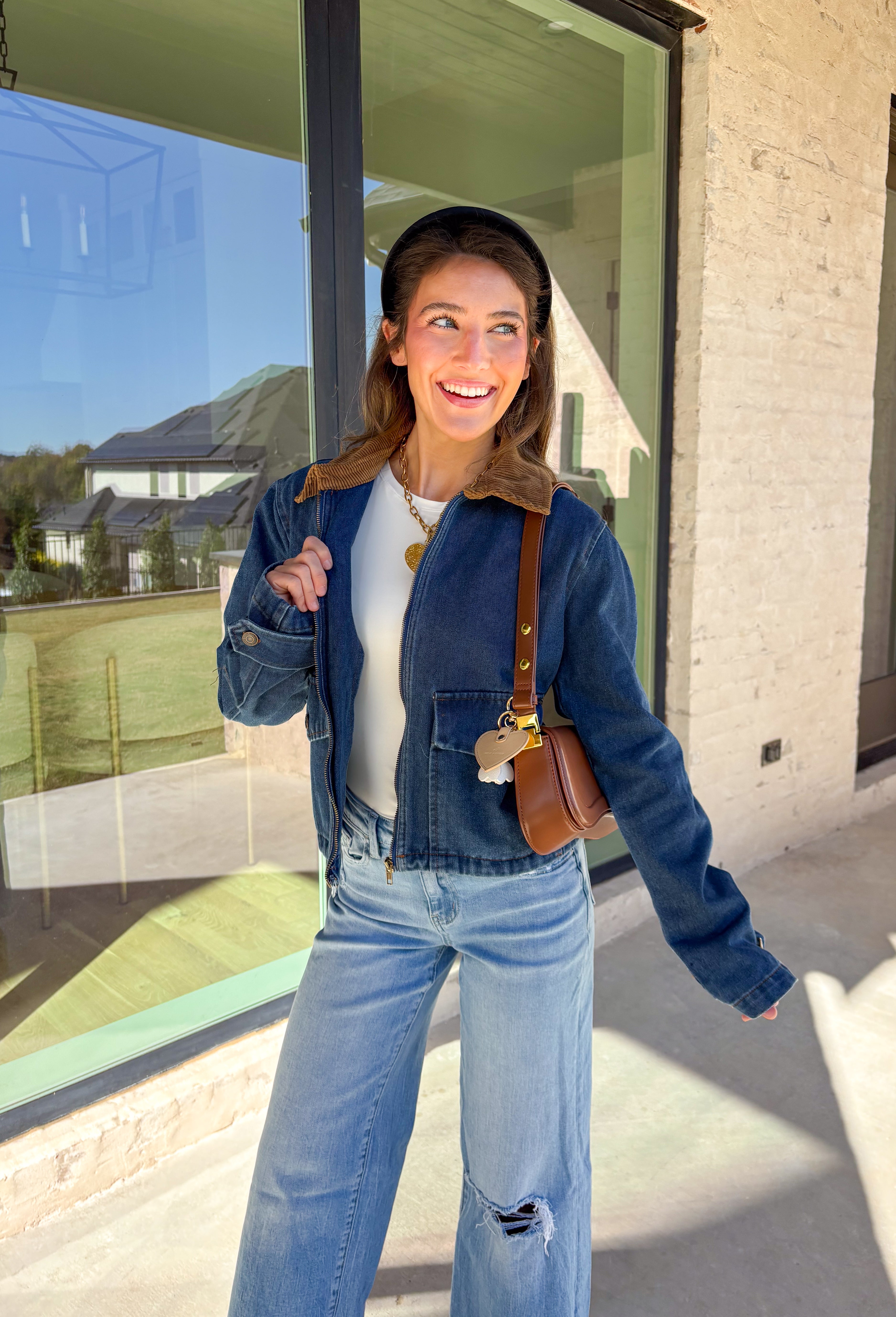 Classic and effortlessly cool, this denim barn jacket by Haute Monde is the perfect layer for the winter season. Featuring a soft brown corduroy collar and zip-front closure, it blends timeless design with everyday comfort. Functional front pockets and structured denim give it that lived-in look you’ll love for layering over your favorite winter sweaters or flannels.