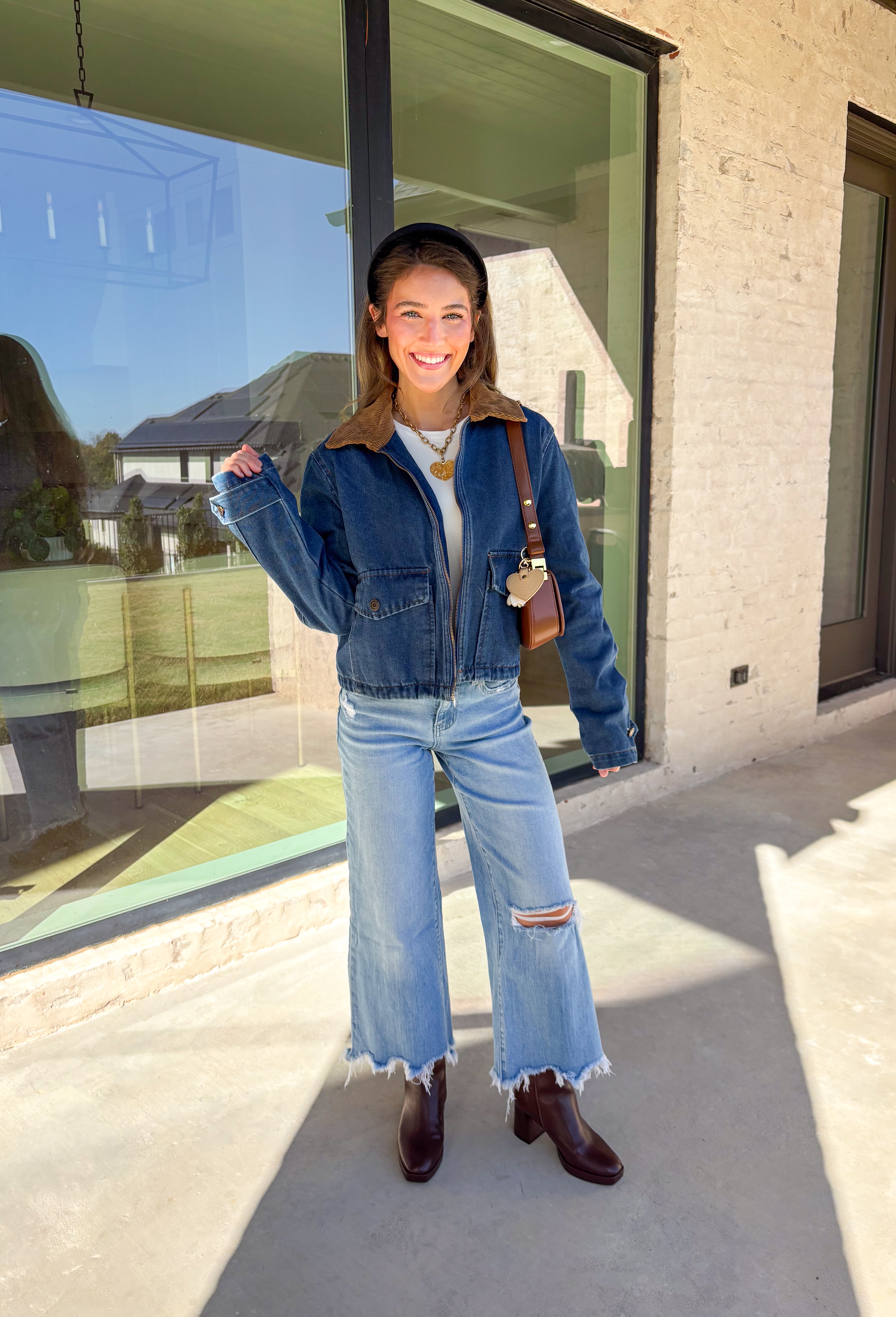 Classic and effortlessly cool, this denim barn jacket by Haute Monde is the perfect layer for the winter season. Featuring a soft brown corduroy collar and zip-front closure, it blends timeless design with everyday comfort. Functional front pockets and structured denim give it that lived-in look you’ll love for layering over your favorite winter sweaters or flannels.