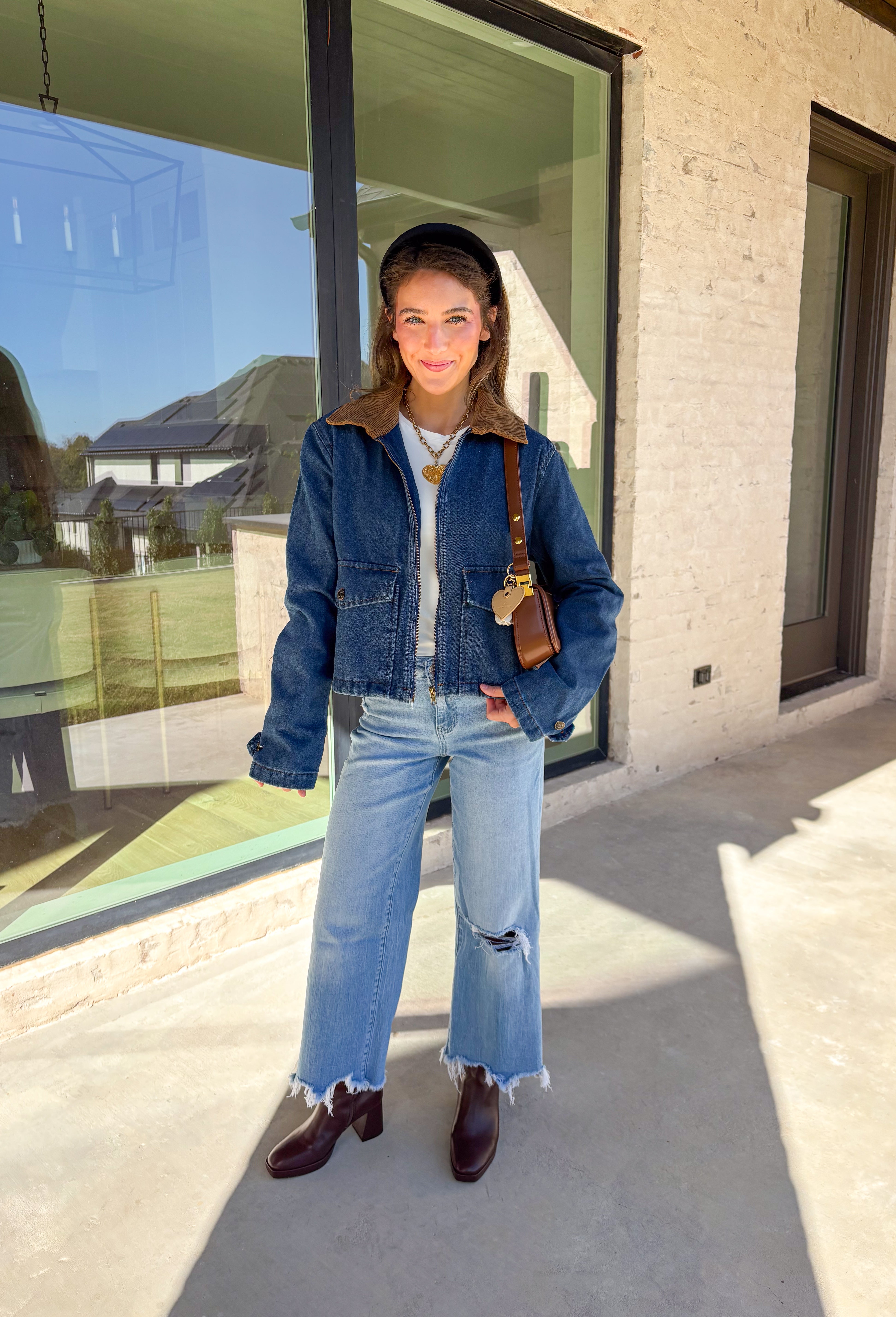 Classic and effortlessly cool, this denim barn jacket by Haute Monde is the perfect layer for the winter season. Featuring a soft brown corduroy collar and zip-front closure, it blends timeless design with everyday comfort. Functional front pockets and structured denim give it that lived-in look you’ll love for layering over your favorite winter sweaters or flannels.